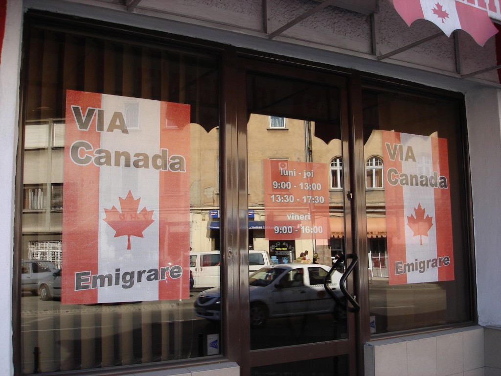 A store-front in Braşov urges Romanians to emigrate to vampire-free Canada.