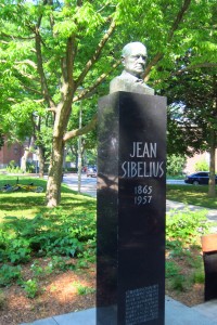 The composer scowls menacingly over little children playing in Toronto's Sibelius Park
