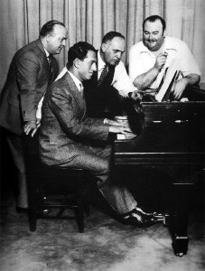 (L-R) Ferde Grofé, George Gershwin, the impressario Roxy Rothafel, Paul Whiteman